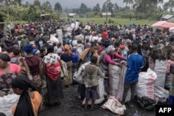 Internally displaced people (IDP) sell charcoal in Kibati north of the city of Goma, Jan. 13, 2023.
