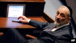 FILE - Member of Knesset Aryeh Deri attends a special session of the Knesset, Israel's parliament, in Jerusalem on Dec. 29, 2022. 