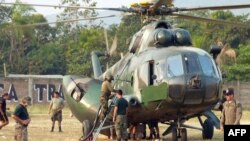 FILE - A Russian-made Mi-17 helicopter is shown at the Pichari military base in Cuzco, Peru, Aug. 21, 2010. The U.S. is working with some Central and South American countries to try to get them to send Russian-made equipment like this to Ukraine.