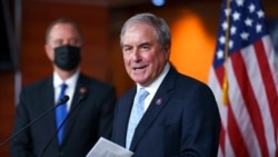 FILE - In this Sept. 21, 2021, photo, House Budget Committee Chair John Yarmuth, D-Ky., joined at left by House Intelligence Committee Chairman Adam Schiff, D-Calif., talks to reporters at the Capitol in Washington.