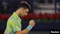 Serbia's Novak Djokovic reacts during his quarter final match against Poland's Hubert Hurkacz at the ATP 500 Dubai Tennis Championships at the Dubai Duty Free Tennis Centre, Dubai, United Arab Emirates on March 2, 2023.