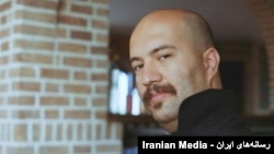 آرش عاشوری‌نیا، عکاس خبری.