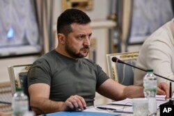 Ukrainian President Volodymyr Zelenskyy meets with U.S. Secretary of State Antony Blinken in Kyiv on September 8, 2022. (Genya Savilov/via AP)