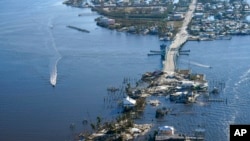 The bridge leading from Fort Myers to Pine Island, Florida, is heavily damaged in the aftermath of Hurricane Ian, Oct. 1, 2022.