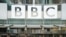 FILE - BBC signage is seen outside the headquarters of the organization, in London, July 19, 2017. 