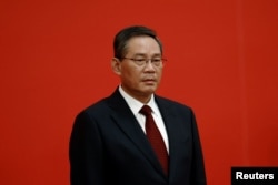 新一届中共中央政治局常委李强