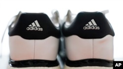 A pair of Adidas shoes is displayed in Vernon Hills, Illinois, Oct 25, 2022. 