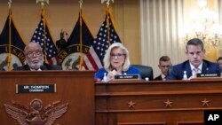 Vice chair Rep. Liz Cheney offers a motion to subpoena former President Donald Trump as Chairman Rep. Bennie Thompson, left, and Rep. Adam Kinzinger listen during the House select committee investigating the Jan. 6 attack on the U.S. Capitol, Oct. 13, 2022.