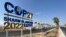 View of a COP27 sign on the road leading to the conference area in Egypt's Red Sea resort of Sharm el-Sheikh, Oct. 20, 2022.