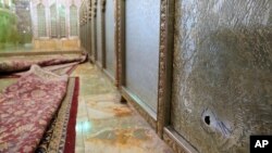 FILE - The scene of an attack on the Shah Cheragh shrine in Shiraz, Iran, Oct. 26, 2022, that killed 15 people. (Iranian Students' News Agency, ISNA, via AP).