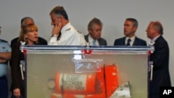 FILE - One of the two flight recorders of the Air France flight 447, that crashed in 2009, is displayed to reporters during a press conference at the French investigators' headquarters in Le Bourget, near Paris, May 12, 2011.