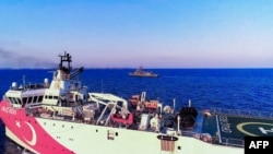 FILE - This handout photograph released Aug. 12, 2020 shows Turkish seismic research vessel 'Oruc Reis' heading in the west of Antalya on the Mediterranean Sea. (Photo by handout/Turkish Defense Ministry/AFP) 