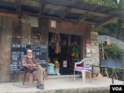 Sain Khan at his grocery shop near the Line of Control between India and Pakistan, in Teetwal in north Kashmir's Kupwara district. (M. Hamid)