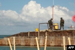 Wanajeshi wa Rwanda wakiwa katika eneo mchimbo ya mradi wa nishati la Cabo Delgado, Msumbiji.