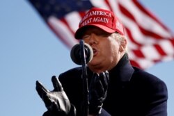 U.S. President Donald Trump speaks during a campaign rally at Fayetteville Regional Airport in Fayetteville, North Carolina, Nov. 2, 2020.