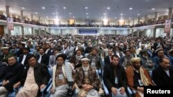 Members of the Afghan Loya Jirga attend a gathering in Kabul, Nov. 21, 2013. 