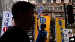 香港2023年12月10日举行了新规则下“仅限爱国者”参与的区议会选举。（美联社）