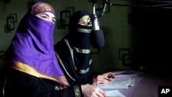 Broadcasters of Radio Shaesta prepare themselves to go on-air, in Kunduz, Afghanistan, March 4, 2016. 