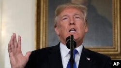 President Donald Trump announces a new Iran policy from the Diplomatic Reception Room of the White House, Oct. 13, 2017.