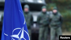 资料照：北约的“增强前沿驻军”战斗组在拉脱维亚举行军演。（2019年10月5日）