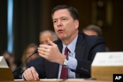 FBI Director James Comey testifies on Capitol Hill in Washington, Jan. 10, 2017, before the Senate Intelligence Committee hearing on Russian Intelligence Activities.