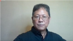 Managing Director Political Economy and Policy Studies (PEPS), Anthony Budiawan di dalam acara "Sarasehan Kebangsaan Pandangan Ekonomi Nasional 2021", Kamis 14 Januari 2021. (tangkapan layar)