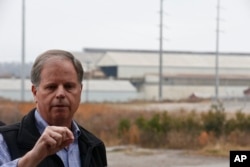 Democratic senatorial candidate Doug Jones speaks at a news conference, Dec. 4, 2017, in Dolomite, Ala.
