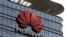 FILE PHOTO: The Huawei logo is pictured outside its Huawei's factory campus in Dongguan, Guangdong province, China, March 25, 2019.
