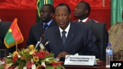 FILE - The president of Burkina Faso, Blaise Compaore, speaks during ECOWAS talks in Ouagadougou, July 7, 2012. The longtime ruler abruptly stepped down Oct. 31, 2014, in the face of protests against his efforts to change the constitution and allow him to run for re-election next year.