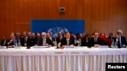 Sekjen PBB Ban Ki-moon (tengah) saat membuka konferensi perdamaian Suriah di Montreux, Swiss hari Rabu (22/1). 