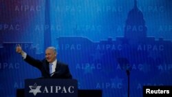 Perdana Menteri Israel Benjamin Netanyahu berbicara di panggung dalam konferensi AIPAC di Washington DC, 6 Maret 2018.
