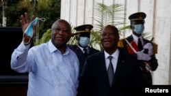 Le président de la Côte d'Ivoire Alassane Ouattara et son prédécesseurs Laurent Gbagbo 