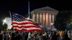 People gather at the Supreme Court in Washington, Saturday night, Sept. 19, 2020, to honor the late Justice Ruth Bader Ginsburg, one of the high court's liberal justices, and a champion of gender equality. Her death leaves a vacancy that could be…