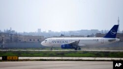 La reapertura del aeropuerto de Alepo representan una victoria simbólica y económica para el gobierno de Bashar al Asad. Foto: SANA via AP-