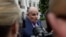 FILE - President Donald Trump's lawyer Rudy Giuliani speaks to reporters on the South Lawn of the White House in Washington, May 30, 2018.