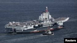 China's aircraft carrier Liaoning sails into Hong Kong, China, July 7, 2017. REUTERS/Bobby Yip
