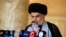 Iraqi Shi'ite cleric Muqtada al-Sadr delivers a sermon to worshippers during Eid al-Fitr prayers at the Kufa mosque near Najaf, June 5, 2019. 