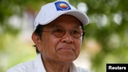FILE PHOTO - Cambodia's opposition leader and President of the National Rescue Party (CNRP) Kem Sokha talks during an interview with Reuters in Prey Veng province, Cambodia May 28, 2017.