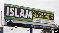 A billboard offering information about Islam is seen on a main road in west Sydney. The billboards, paid by an Islamic group called MyPeace, offer free information about Islam, a free copy of the Koran and other Islamic literature, (File photo June 10, 20
