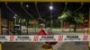 A swing set at a public playground area is closed with security tape that reads 'Danger' in Spanish as a precautionary measure against the spread of the new coronavirus, in Santiago, Chile, March 26, 2020.