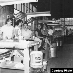 Women workers inside the Gibson guitar factory during World War II. (Photo by Margaret Hart)