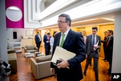 Mexican Foreign Affairs Secretary Marcelo Ebrard arrives for a news conference at the Mexican Embassy in Washington, Tuesday, June 4, 2019, as part of a Mexican delegation in Washington for talks.