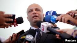 Brazilian Federal Deputy Major Vitor Hugo speaks with journalists after meeting at the Ministry of Economy building in Brasilia, April 2, 2019. 