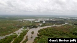 This May 1, 2019, photo shows the Davis Pond Diversion in St. Charles Parish, Louisiana. (AP Photo/Gerald Herbert)