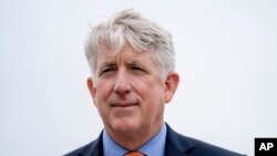 FILE - Virginia Attorney General Mark Herring attends a news conference near the White House, Feb. 26, 2018 in Washington.