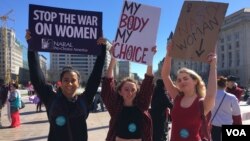 Women march in International Women's Day Protest in Washington, D.C. on March 8, 2017. (Photo: E. Sarai / VOA)