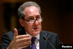 U.S. Trade Representative Michael Froman, shown testifying before a Senate committee last month, says Froman says the Chinese textile, clothing, metal, chemical, medical product, building material and agricultural industries have benefited from illegal as