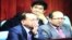 A screen shot from a television monitor showing Hang Puthea (center), a neutral member of election committee, sit in the National Assembly during the election of the National Election Committee at the National Assembly, Phnom Penh, Cambodia. 