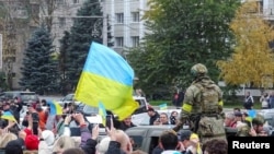 Local residents celebrate after Russia's retreat from Kherson, in central Kherson