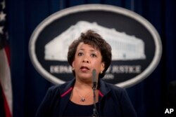 FILE - Attorney General Loretta Lynch speaks at a news conference, Sept. 22, 2016, at the Justice Department in Washington. The Justice Department is moving forward with its plans to collect data on how often law enforcement officers use force.